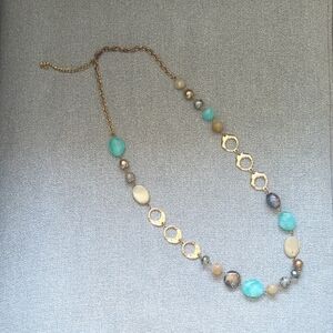 Elegant Gold Toned And Turquoise Colored Statement Necklace